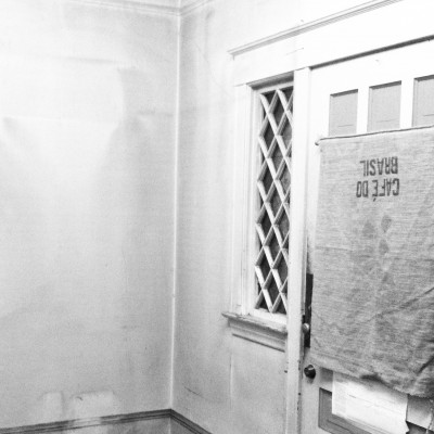 A side window at the front of the house.